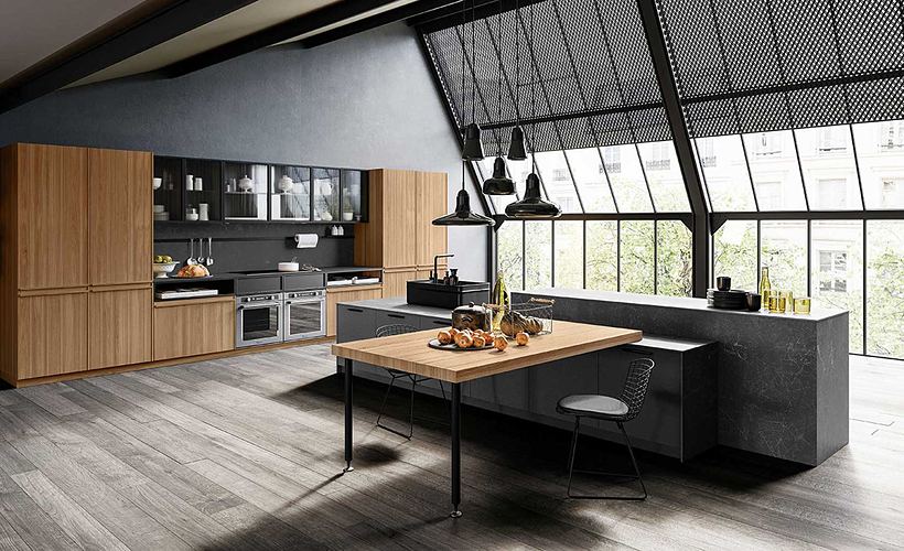 Cucina in rovere e nero in stile loft, con tavolo